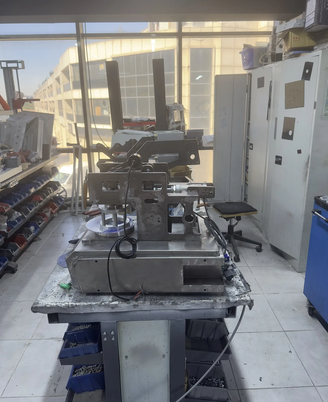 Machined instrument chassis on the assembly bench, TexLab Instruments workshop, Istanbul
